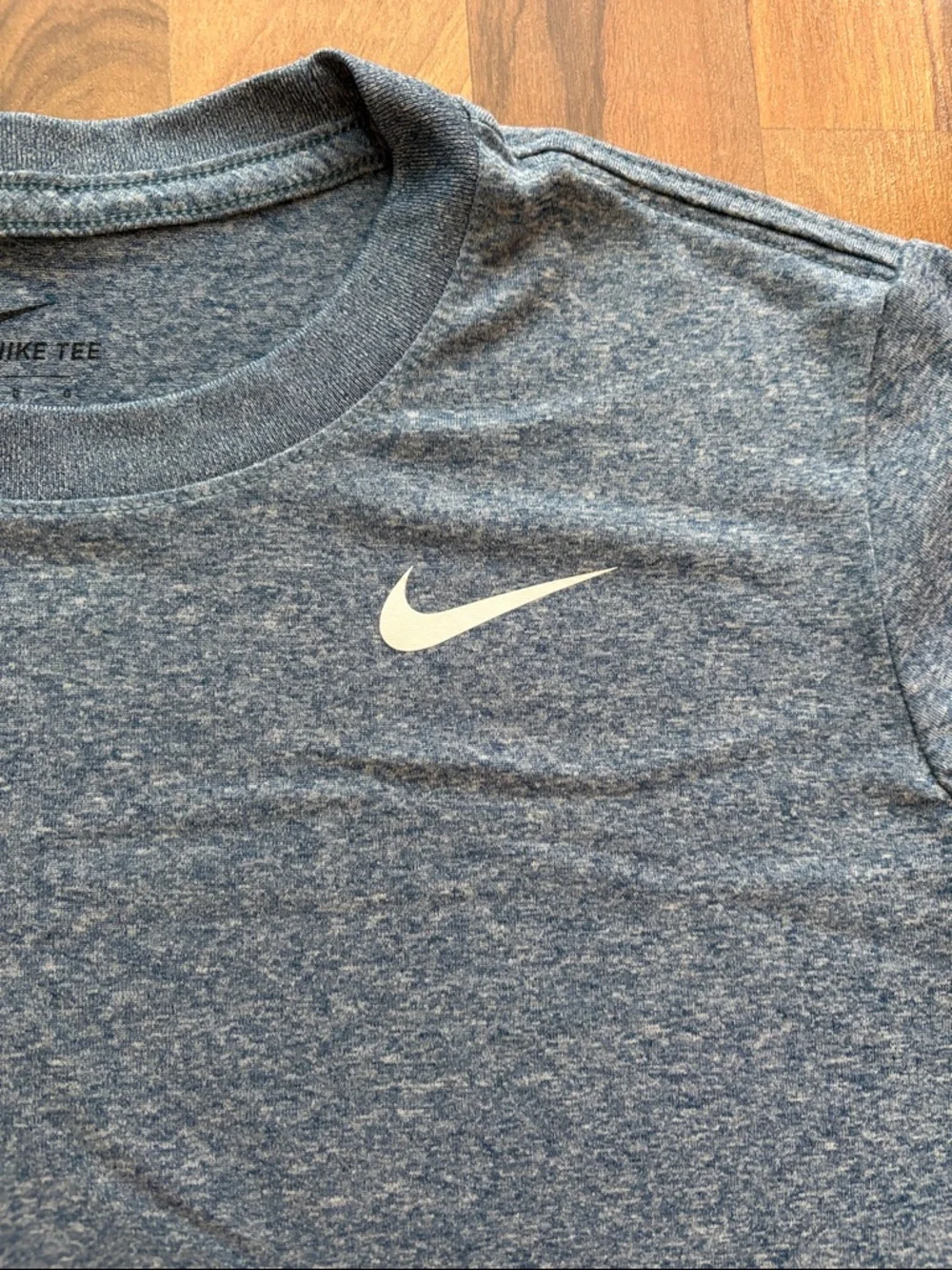 Nike Woman’s Gray/Blue Heather Performance Tee with White Swoosh